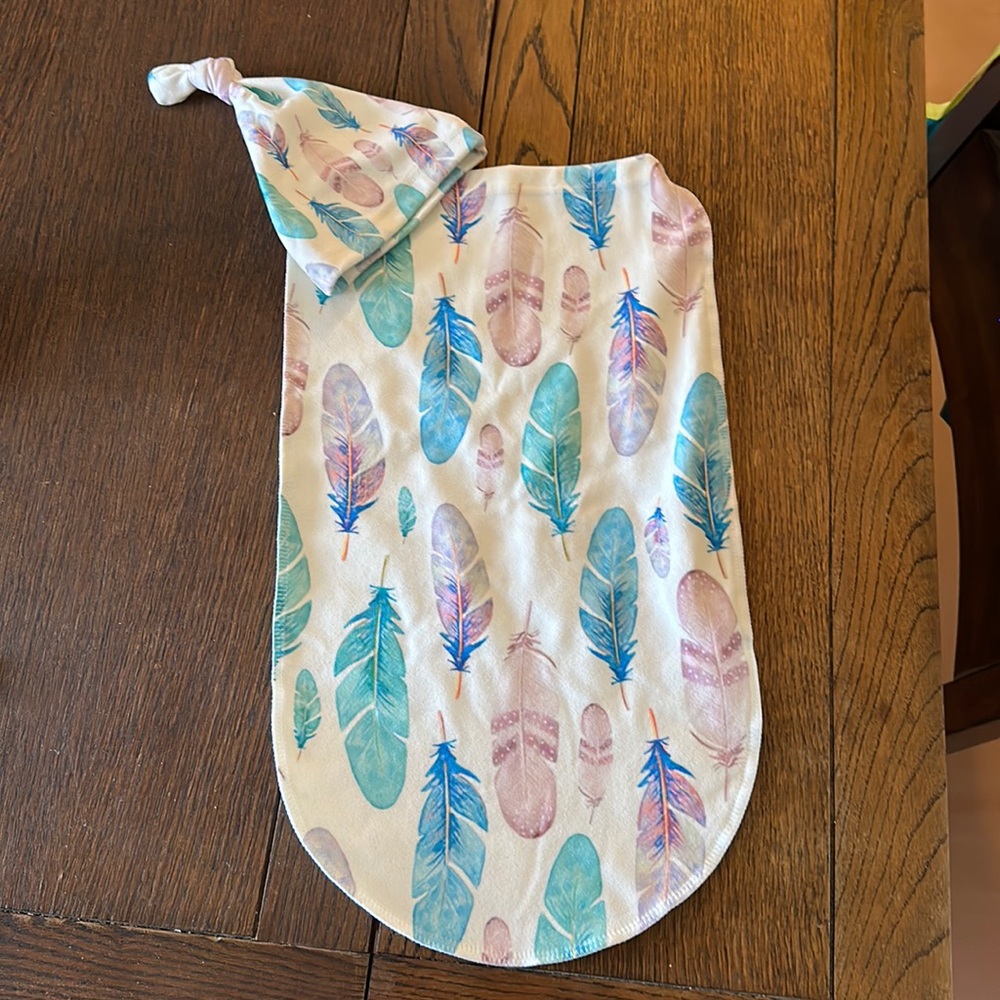 New born swaddle and hat